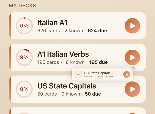 Touch and hold a deck card on the home screen, then drag it up or down to reorder the deck list.
